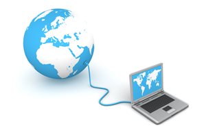 Laptop linked to blue earth globe on white background